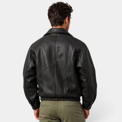 Men's black leather jacket with zipper and elastic hem