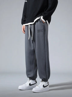 Men's slim-fit knit joggers with spacious pockets