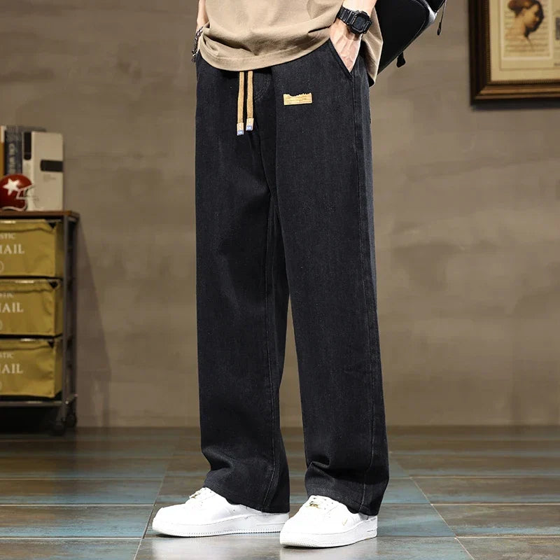 Men's baggy jeans with adjustable drawstring and stretch fabric