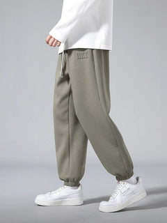 Men's slim-fit knit joggers with spacious pockets