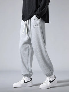 Men's slim-fit knit joggers with spacious pockets