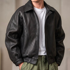 Men's black leather jacket with zipper and elastic hem